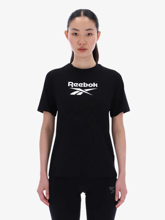 Image of a model wearing Tops. Productname: Reebok Bonnie Graphic Print Crew Neck Short Sleeve Tee in Black colour by brand - Reebok