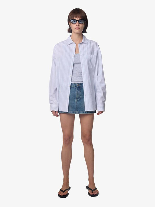 Image of a model wearing Skirts. Productname: Thrills Sophie Skirt in Vintage Garage Blue colour by brand - Thrills