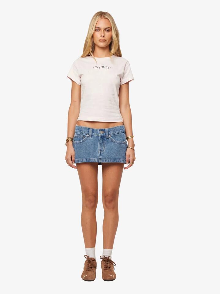 Image of a model wearing Skirts. Productname: Abrand 00 Super Low Mini Skirt in Demi colour by brand - Abrand