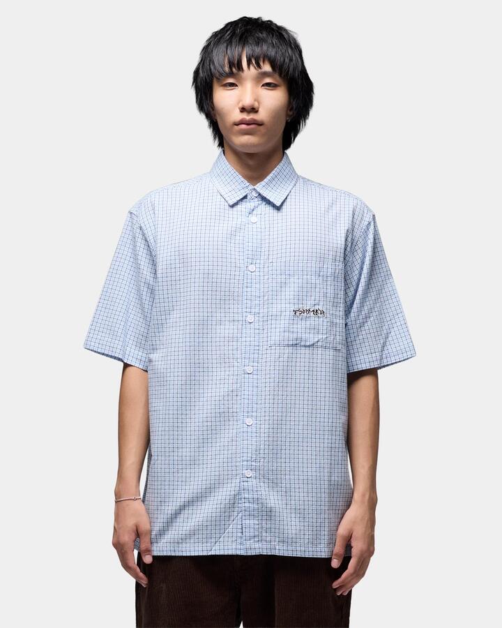 Image of a model wearing Tops. Productname: former - Mens Vivian Check Short Sleeve Shirt - Blue - in Blue colour by brand - former