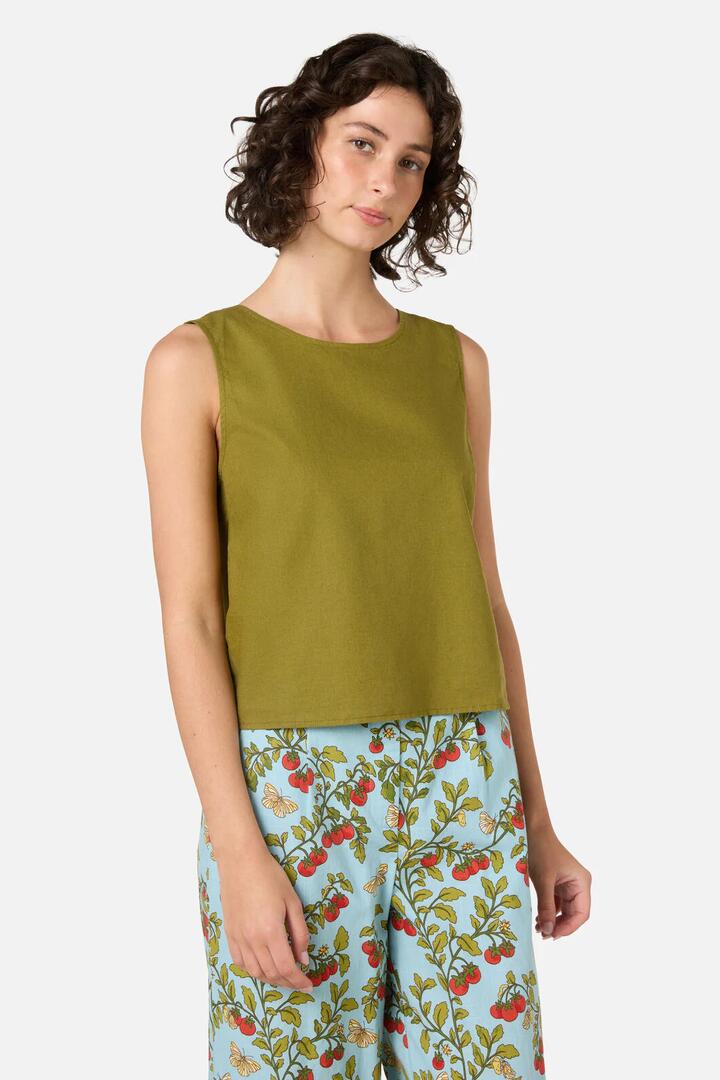 Image of a model wearing Tops. Productname: Hattie Shell Top in Olive colour by brand - Princess Highway