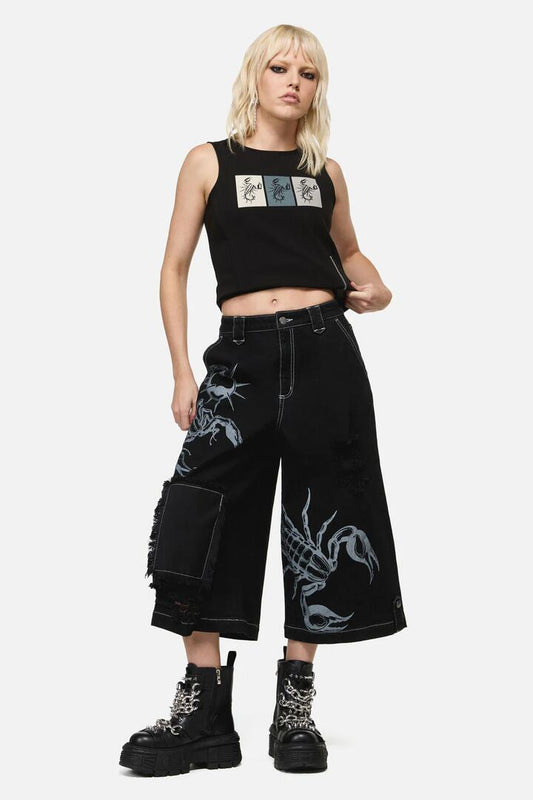 Image of a model wearing Denim. Productname: Dread Distressed Patch Jeans in Black colour by brand - Dangerfield