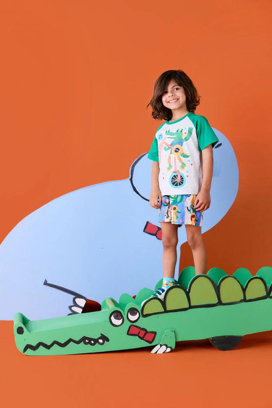 Image of a model wearing Tops. Productname: Party Croc Kids SS Raglan Tee in Multi colour by brand - Gorman