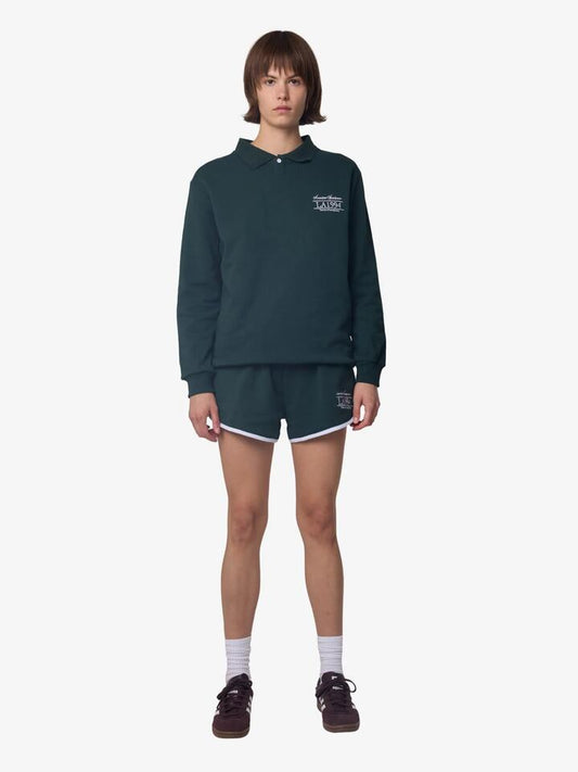 Image of a model wearing Tops. Productname: West Hollywood Sweat Club American Sportswear Long Sleeve Polo in BOTTLE colour by brand - West Hollywood Sweat Club