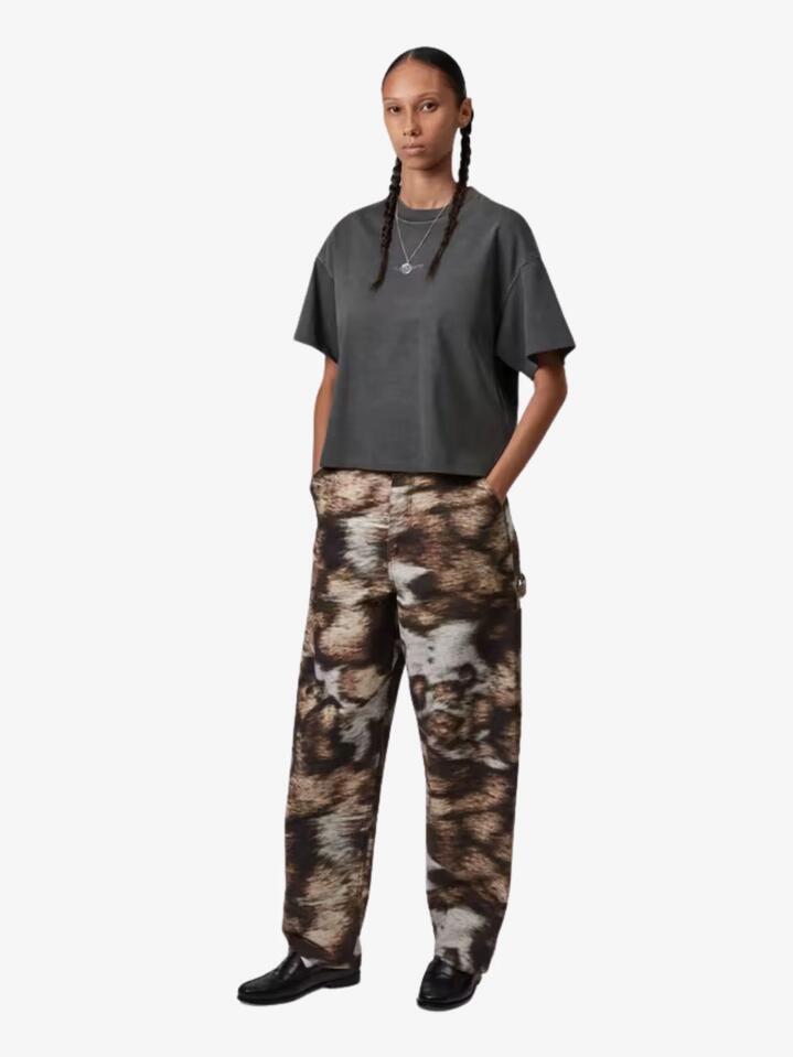 Image of a model wearing Shorts. Productname: Carhartt Wip Womenâs Short Sleeve Benton T-Shirt in Graphite Garment Dyed colour by brand - Carhartt Wip