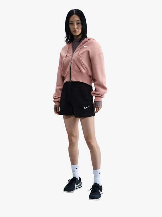 Image of a model wearing Outerwear. Productname: Nike Women's Nike Sportswear Phoenix Fleece Short in Black/Sail colour by brand - Nike
