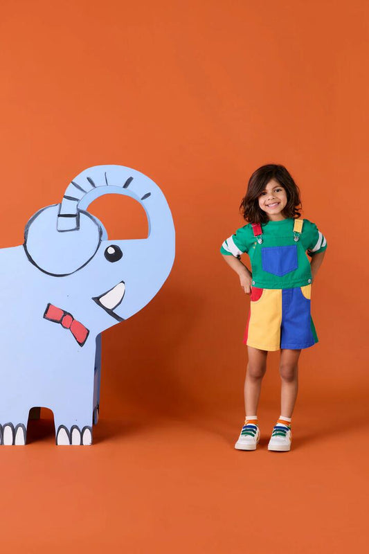 Image of a model wearing Pants. Product name - Colour Block Kids Overalls Red in Multi colour by brand - Gorman
