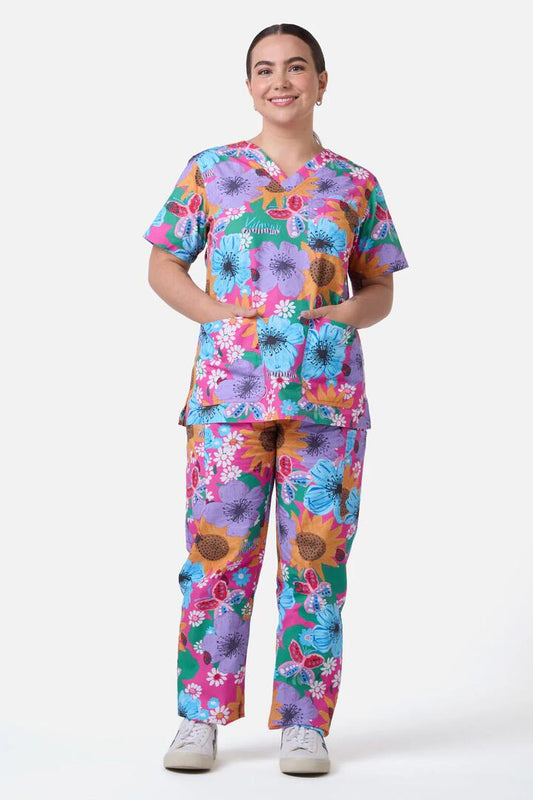 Image of a model wearing Uniforms & Workwear. Product name - Floral Bouquet Scrub Set in Multi colour by brand - Gorman