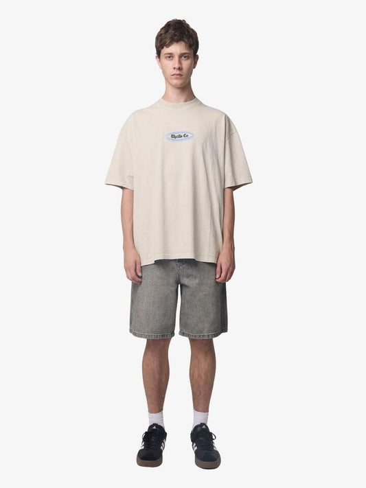 Image of a model wearing Tops. Productname: Thrills Bueno Bueno Bueno Tee in Oatmeal colour by brand - Thrills