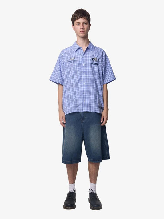 Image of a model wearing Tops. Productname: Worship Injection Shirt in Blue colour by brand - Worship