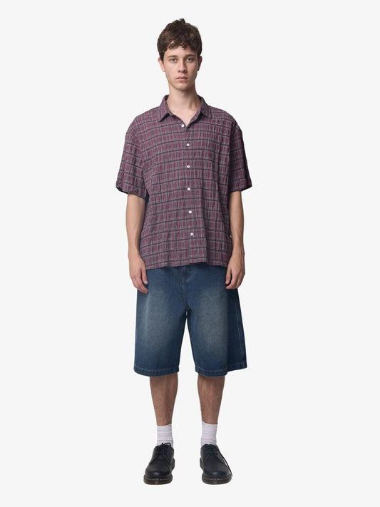 Image of a model wearing Tops. Productname: Thrills Excitement Shirt in Shiraz colour by brand - Thrills