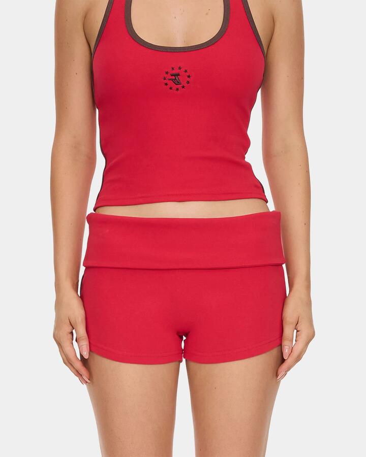Image of a model wearing Shorts. Productname: thrills - Womens Hot Shot Booty Shorts - Cherry - in Cherry colour by brand - thrills