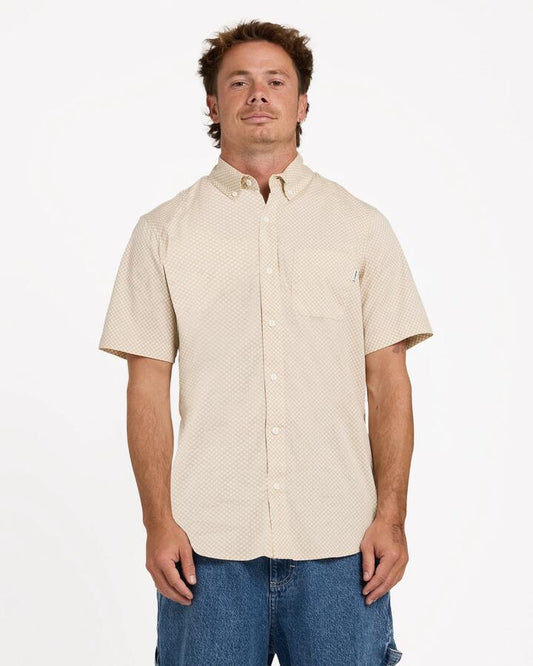 Image of a model wearing Tops. Productname: Element - Mens Beyond 2 Short Sleeve Shirt - Egret - in Egret colour by brand - Element