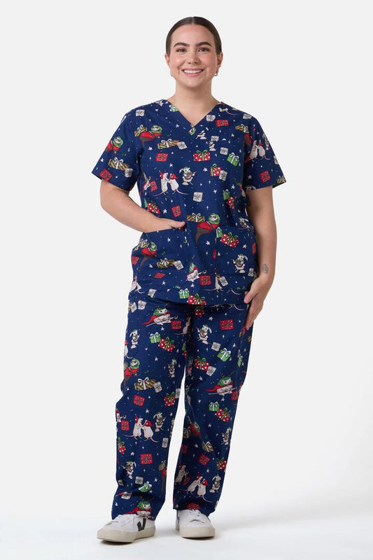 Image of a model wearing Uniforms & Workwear. Productname: Christmas Creatures Scrub Set in Navy colour by brand - Scrubs With Love