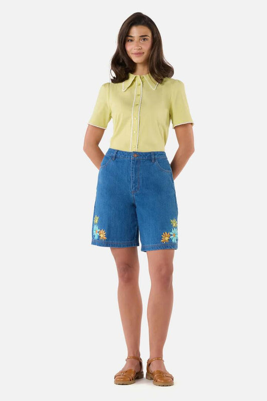 Image of a model wearing Shorts. Productname: Sweet Daisy Embroidered Short in Blue Denim colour by brand - Princess Highway