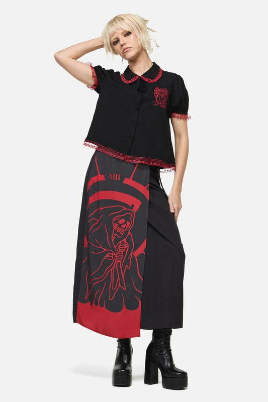 Image of a model wearing Skirts. Productname: Reaper Goth Midi Wrap Skirt in Black colour by brand - Dangerfield