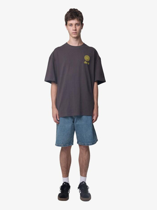 Image of a model wearing Tops. Productname: Deus Strata Tee in Anthracite colour by brand - Deus