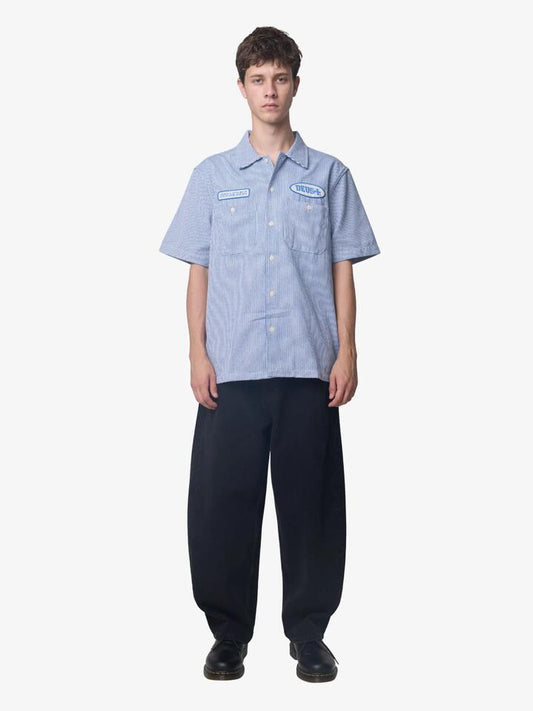 Image of a model wearing Tops. Productname: Deus No Shelter Work Shirt in BLUESTRIPE colour by brand - Deus