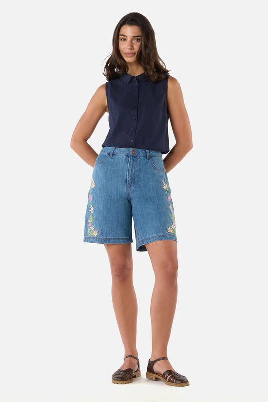 Image of a model wearing Shorts. Productname: Sweet Native Embroidered Short in Blue Denim colour by brand - Princess Highway