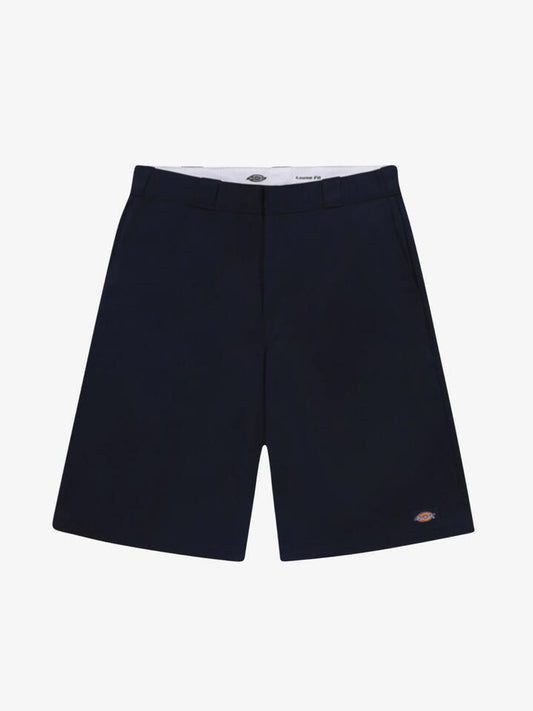 Image of a model wearing Shorts. Productname: Dickies 13inch Loose Fit Shorts in Navy colour by brand - Dickies