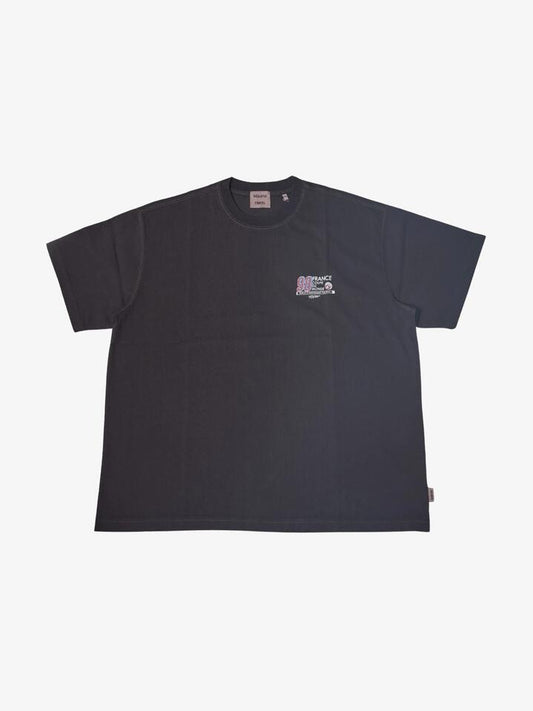 Image of a model wearing Tops. Productname: Weekend Cartel France 98 Tee in WASHED BLACK colour by brand - Weekend Cartel