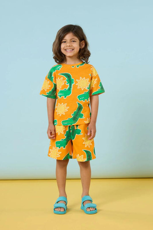 Image of a model wearing Tops. Productname: Sunny Croc Kids SS Tee in Orange colour by brand - Gorman