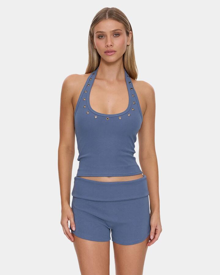 Image of a model wearing Tops. Product name - Thrills Womens Leving Easy Eyelet Halter Tank Top Bluefin in Bluefin colour by brand - Thrills