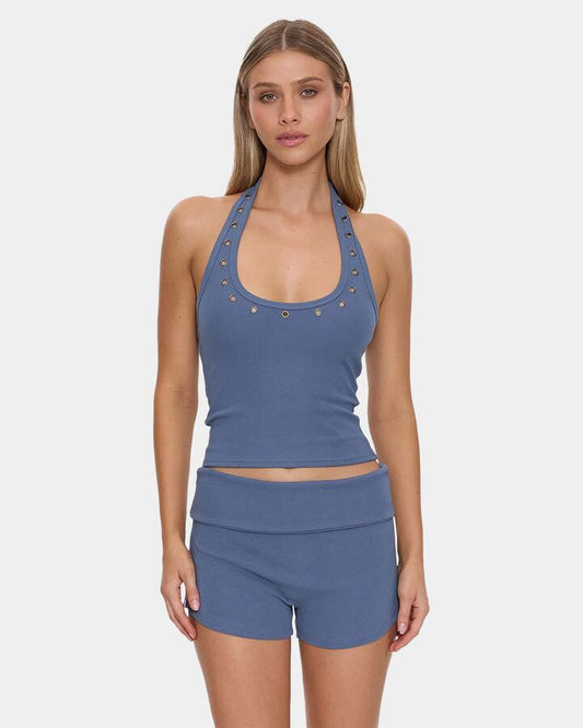 Image of a model wearing Tops. Product name - Thrills Womens Leving Easy Eyelet Halter Tank Top Bluefin in Bluefin colour by brand - Thrills