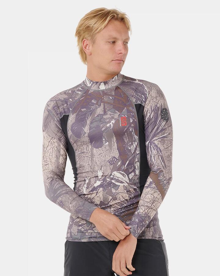 Image of a model wearing Tops. Product name - Rip Curl Mens Search Upf Performance Long Sleeve Rash Vest Cactus in Cactus colour by brand - Rip Curl