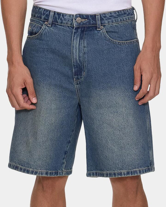 Image of a model wearing Shorts. Productname: worship - Mens Devilish Carpenter Denim Shorts - Dirty Mid Blue - in Dirty Mid Blue colour by brand - worship