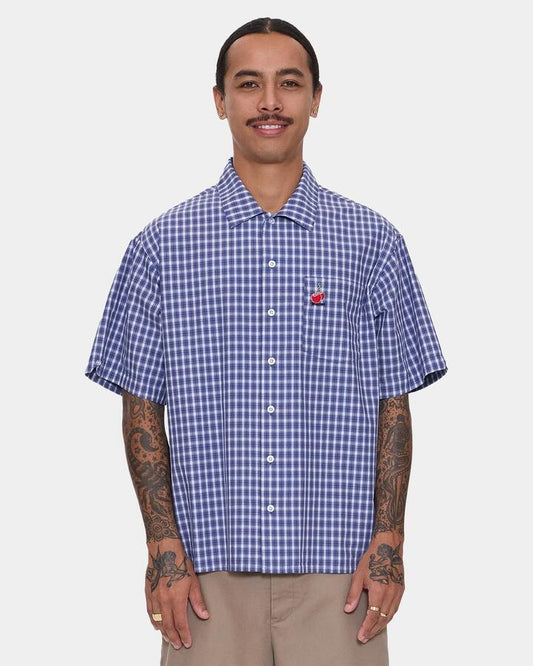 Image of a model wearing Tops. Product name - Worship Mens Glazed And Confused Short Sleeve Shirt Blue in Blue colour by brand - Worship