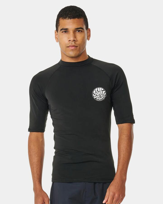 Image of a model wearing Tops. Productname: rip Curl Mens Icon Upf Brushed Short Sleeve Rash Vest Black - in Black colour by brand - rip Curl