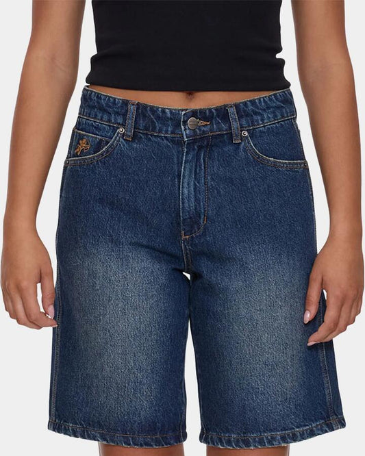 Image of a model wearing Shorts. Productname: worship Womens Sloucher Denim Shorts Dirty Mid Blue - in Dirty Mid Blue colour by brand - Worship