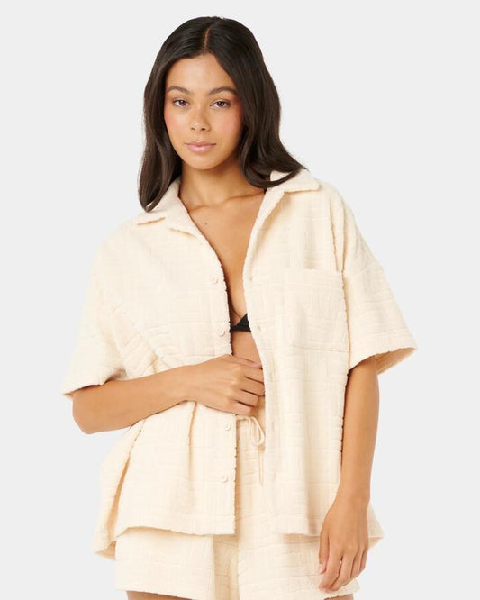 Image of a model wearing Tops. Productname: rip Curl - Womens Aloha State Short Sleeve Shirt - Off White - in Off White colour by brand - rip Curl