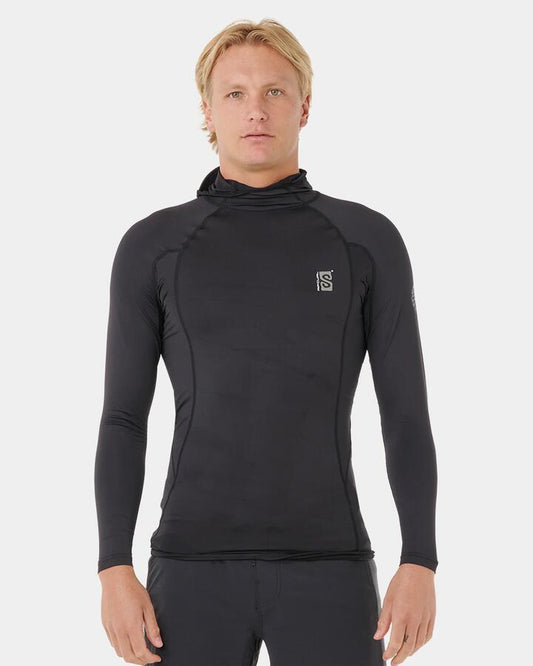 Image of a model wearing Tops. Productname: rip Curl - Mens Search Upf Performance Hood Long Sleeve Rash Vest - Black - in Black colour by brand - rip Curl
