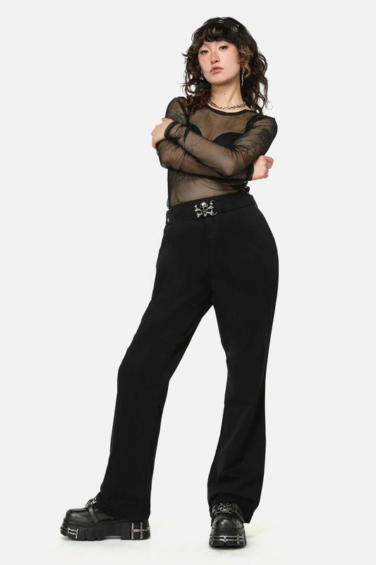 Image of a model wearing Pants. Productname: Pirate Skull Trim Goth Flare Pant in Black colour by brand - Dangerfield