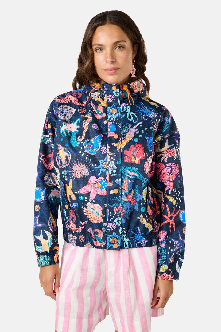 Image of a model wearing Rain Coats. Product name - Mermaid Print Raincoat in Print colour by brand - Gorman