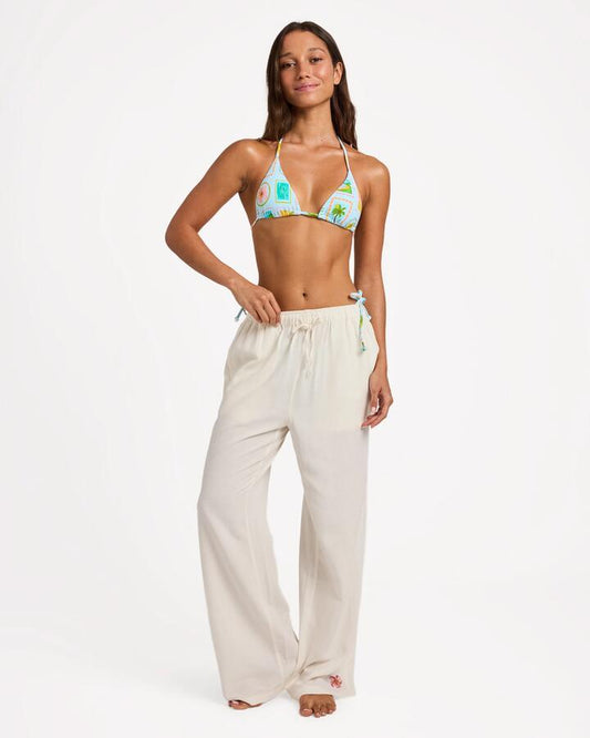 Image of a model wearing Pants. Productname: Roxy - Womens Hibiscus Beach Pants - Egret - in Egret colour by brand - Roxy