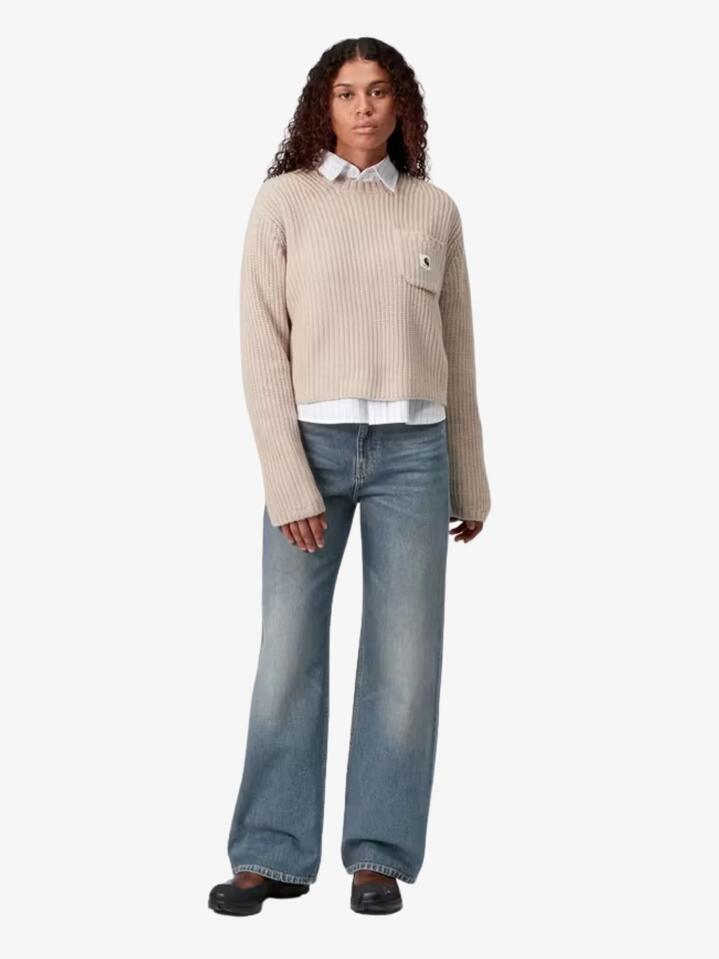 Image of a model wearing Pants. Productname: Carhartt Wip Women's Jane Pant in Blue Dark Used Wash colour by brand - Carhartt Wip