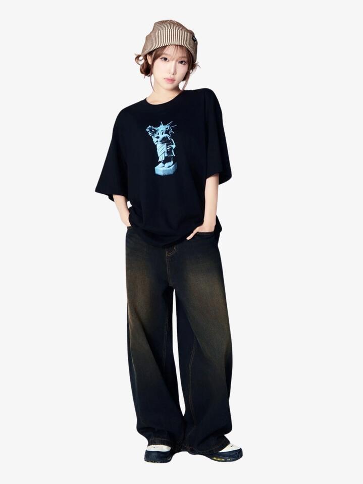 Image of a model wearing Shorts. Productname: ADLV Ac Bear Statue Of Liberty Short Sleeve T-Shirt in Black colour by brand - ADLV