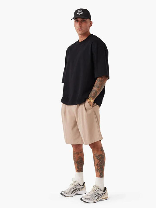 Image of a model wearing Tops. Productname: Zanerobe Flow Crop Tee in Black colour by brand - Zanerobe