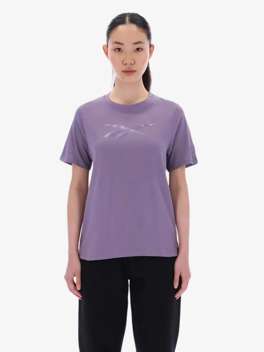 Image of a model wearing Tops. Productname: Reebok Audrey Tonal Logo Crew Neck Ss Tee in Purple Fusion colour by brand - Reebok