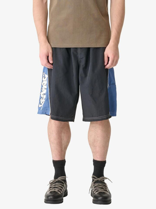 Image of a model wearing Shorts. Productname: Xlarge 3D Shorts in Black colour by brand - Xlarge