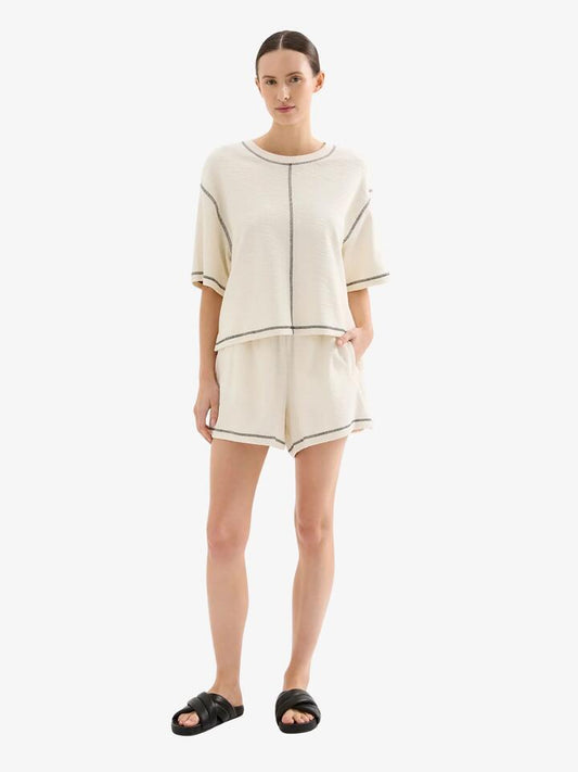 Image of a model wearing Shorts. Productname: Nude Lucy Sutton Short in Salt colour by brand - Nude Lucy