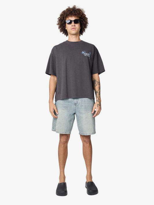 Image of a model wearing Tops. Productname: Ksubi Stick It Halen Tee in Faded Black colour by brand - Ksubi