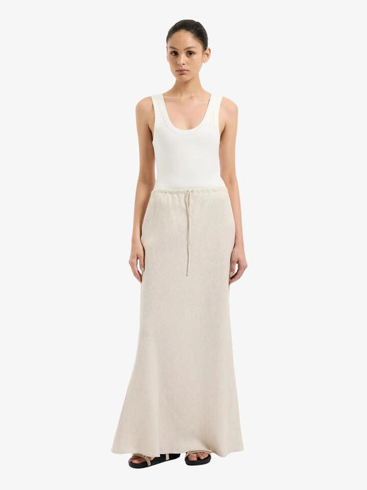 Image of a model wearing Skirts. Productname: Nude Lucy Amani Linen Skirt in Natural colour by brand - Nude Lucy
