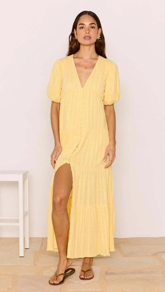 Image of Dresses. Product name - Relaxed Yellow Cotton Tiered Maxi Dress in Yellow colour by brand - MINKPINK