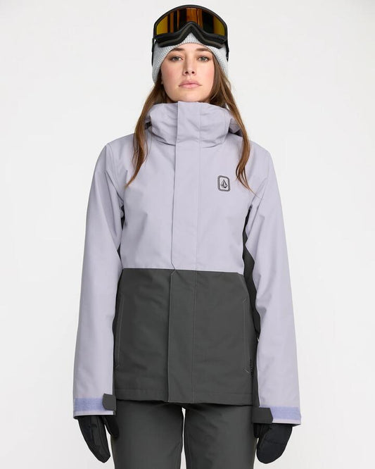 Image of a model wearing Outerwear. Productname: Volcom - Womens Bolt Insulated Jacket - Lavender Aura - in Lavender Aura colour by brand - Volcom