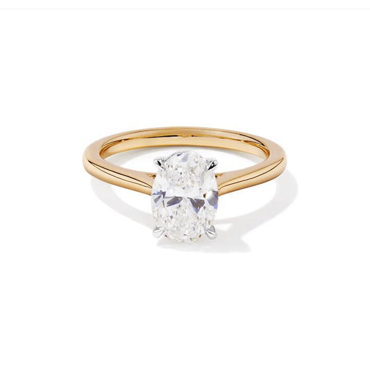 Image of Rings. Productname: 1.50ct Oval Cut Four Claw Solitaire Ring in 9kt Yellow Gold in Diamond colour by brand - Bevilles
