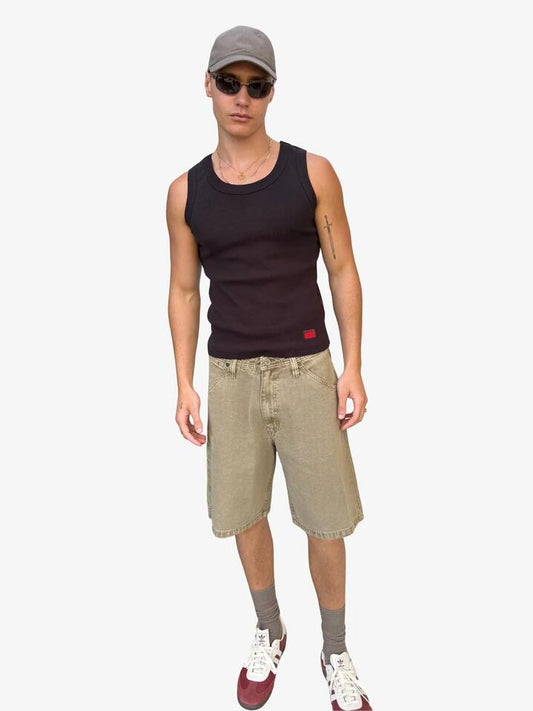 Image of a model wearing Shorts. Productname: Abrand A5 Canvas Work Shorts in Dune colour by brand - Abrand